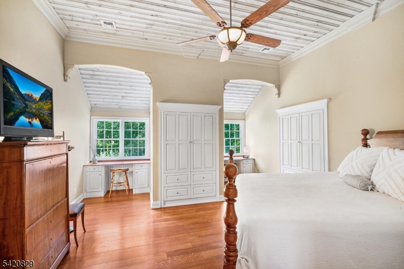 3 Laurel Lane Chester, NJ 07930 - Photo 24 of 37 a bedroom with a bed and a flat screen tv