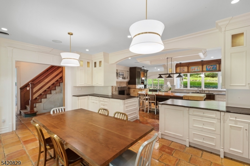 3 Laurel Lane Chester, NJ 07930 - Photo 26 of 37 a kitchen with a table chairs sink and cabinets