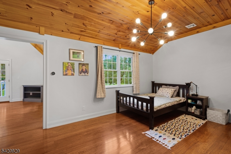 3 Laurel Lane Chester, NJ 07930 - Photo 32 of 37 a living room with furniture and wooden floor
