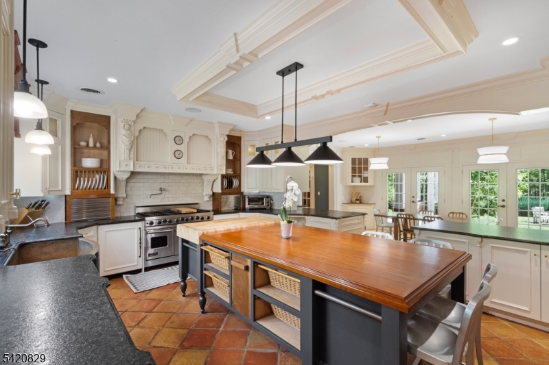 3 Laurel Lane Chester, NJ 07930 - Photo 9 of 37 a kitchen with stainless steel appliances a stove a sink a counter top space and living room view