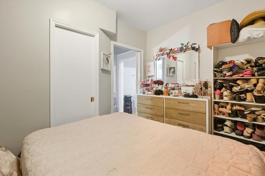 2511 West Abdella Street Tampa, FL 33607 - Photo 11 of 17 a bedroom with a bed and a window