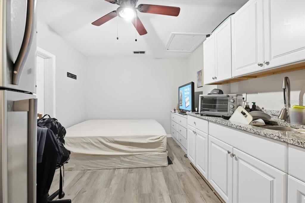 2511 West Abdella Street Tampa, FL 33607 - Photo 13 of 17 a bathroom with a sink a toilet and shower