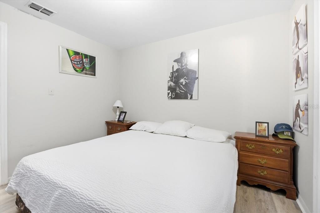 2511 West Abdella Street Tampa, FL 33607 - Photo 14 of 17 a bedroom with a bed and a desk