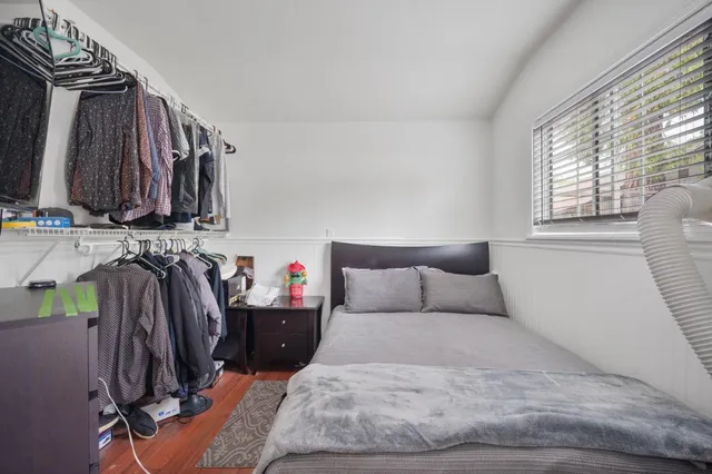 a kitchen with a stove and a white refrigerator