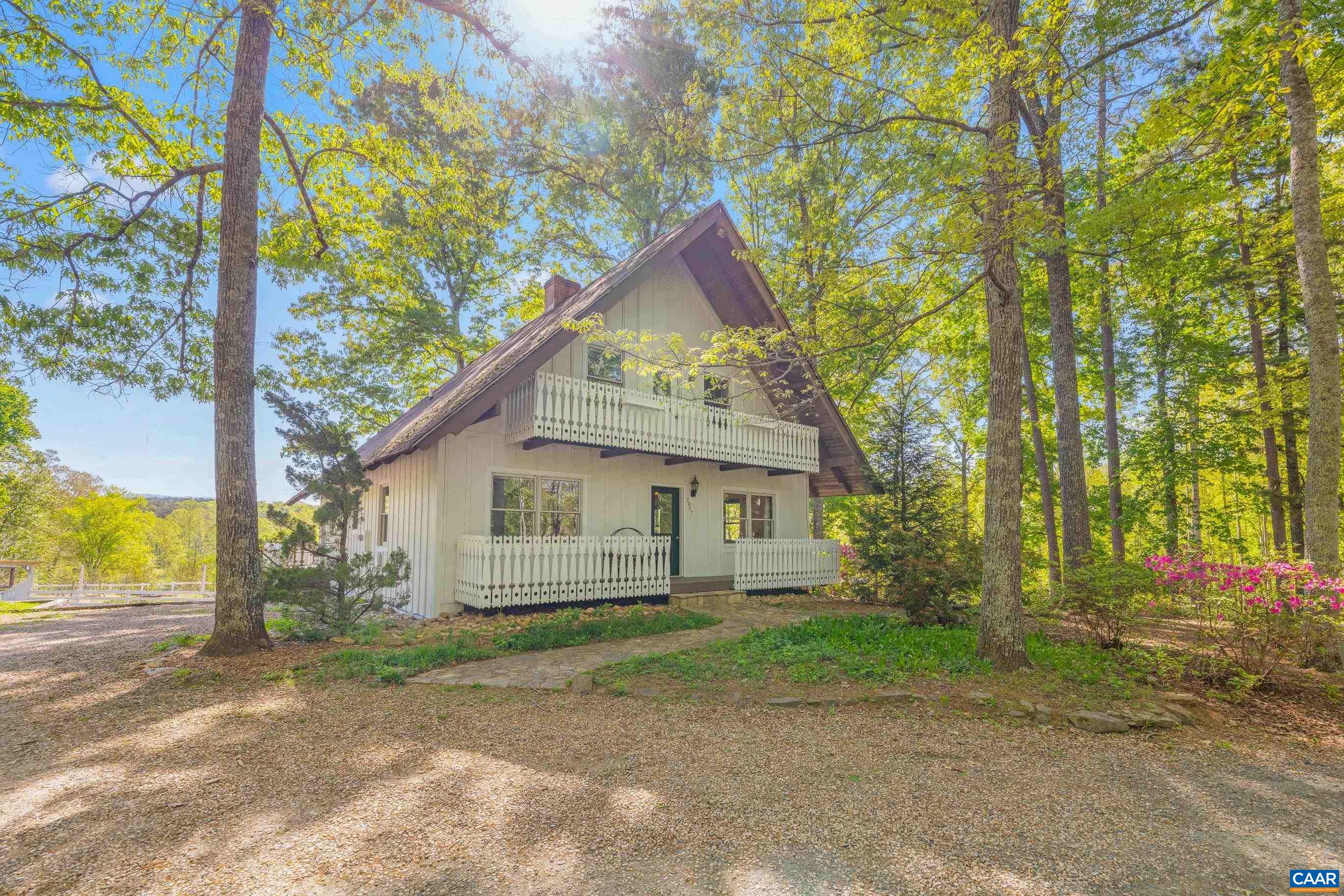 2947 Merrie Meadows Lane Keswick, VA 22947 - Photo 1 of 75 a view of backyard of house with green space