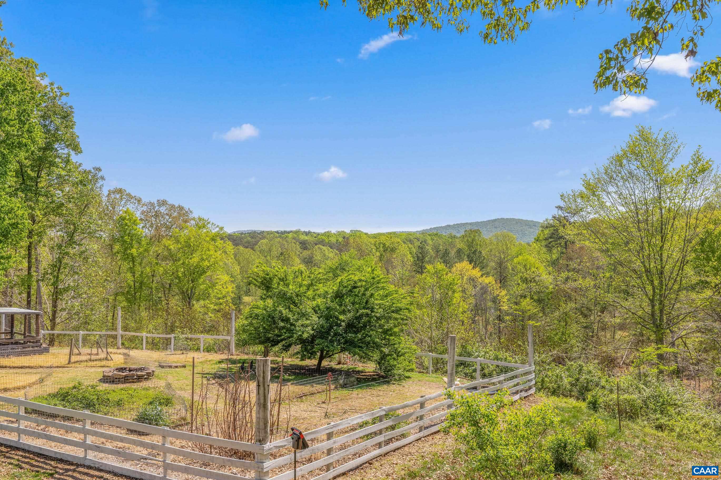 2947 Merrie Meadows Lane Keswick, VA 22947 - Photo 3 of 75 a view of a swimming pool with a yard
