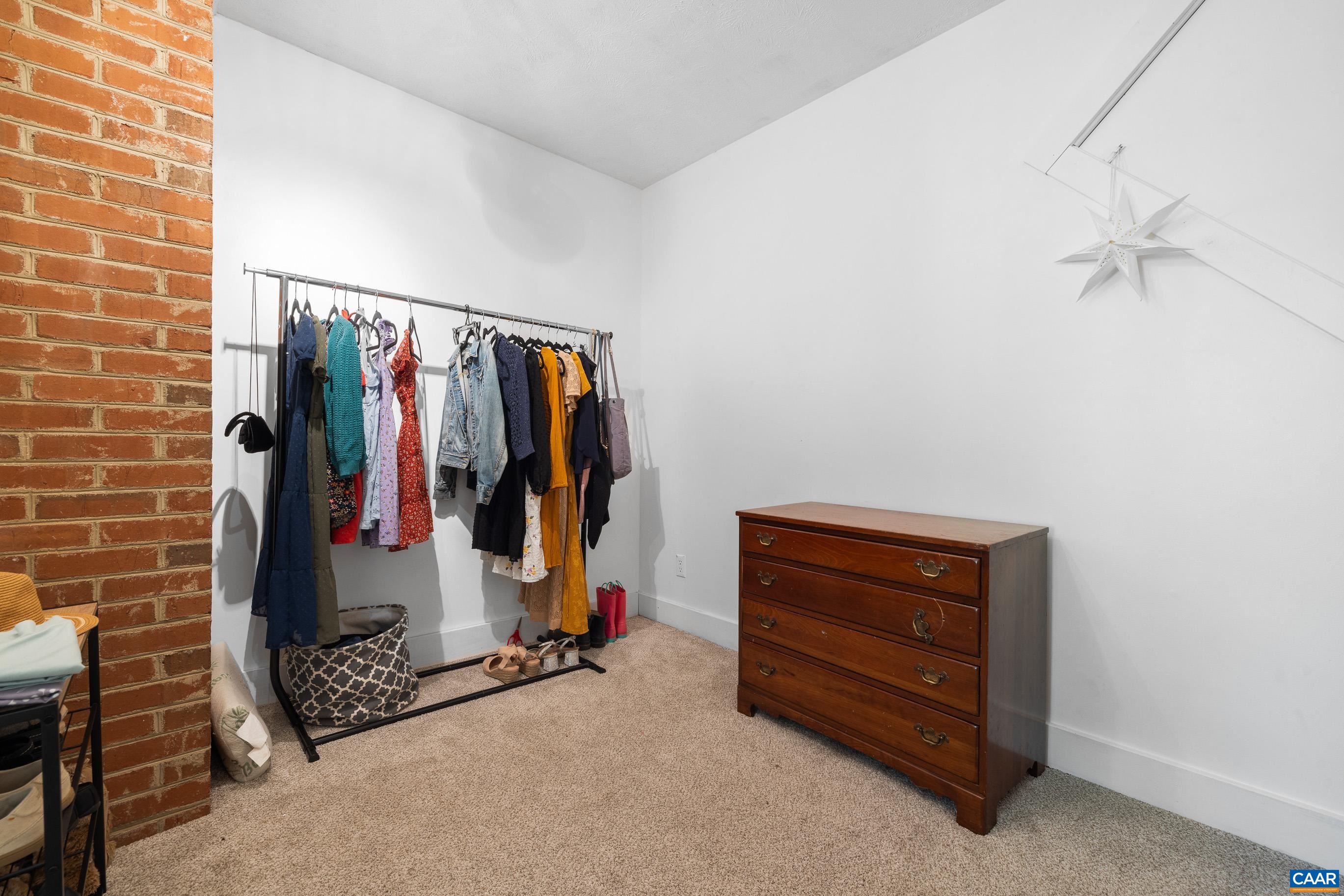 2947 Merrie Meadows Lane Keswick, VA 22947 - Photo 48 of 75 a view of walk in closet with clothes