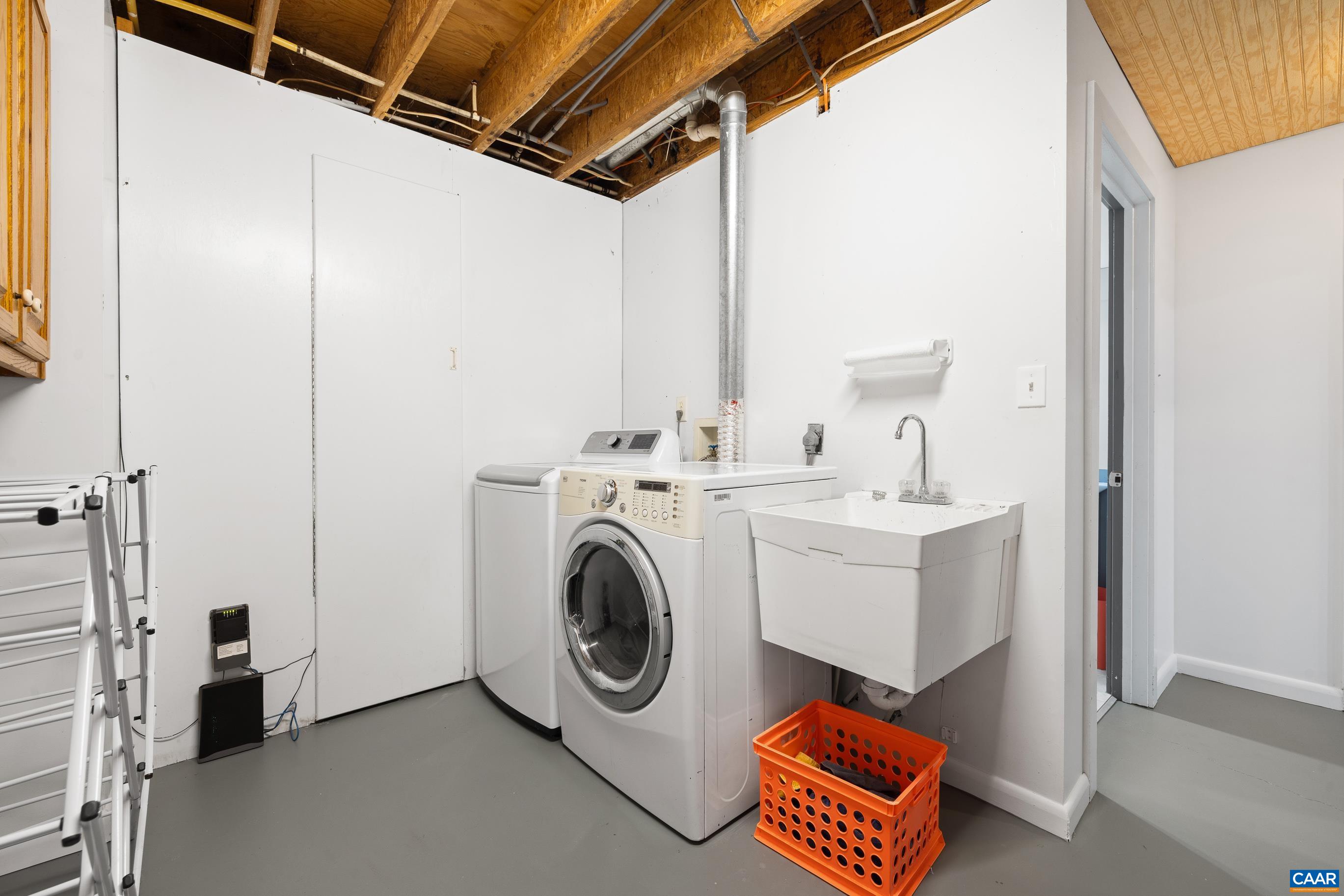 2947 Merrie Meadows Lane Keswick, VA 22947 - Photo 64 of 75 a utility room with dryer and washer