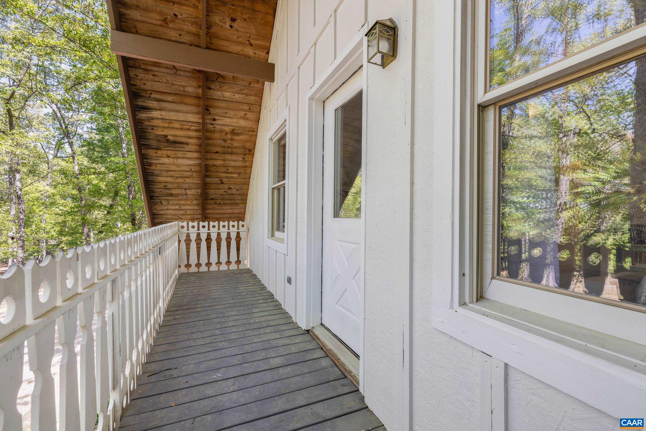 2947 Merrie Meadows Lane Keswick, VA 22947 - Photo 66 of 75 a view of a balcony with wooden floor