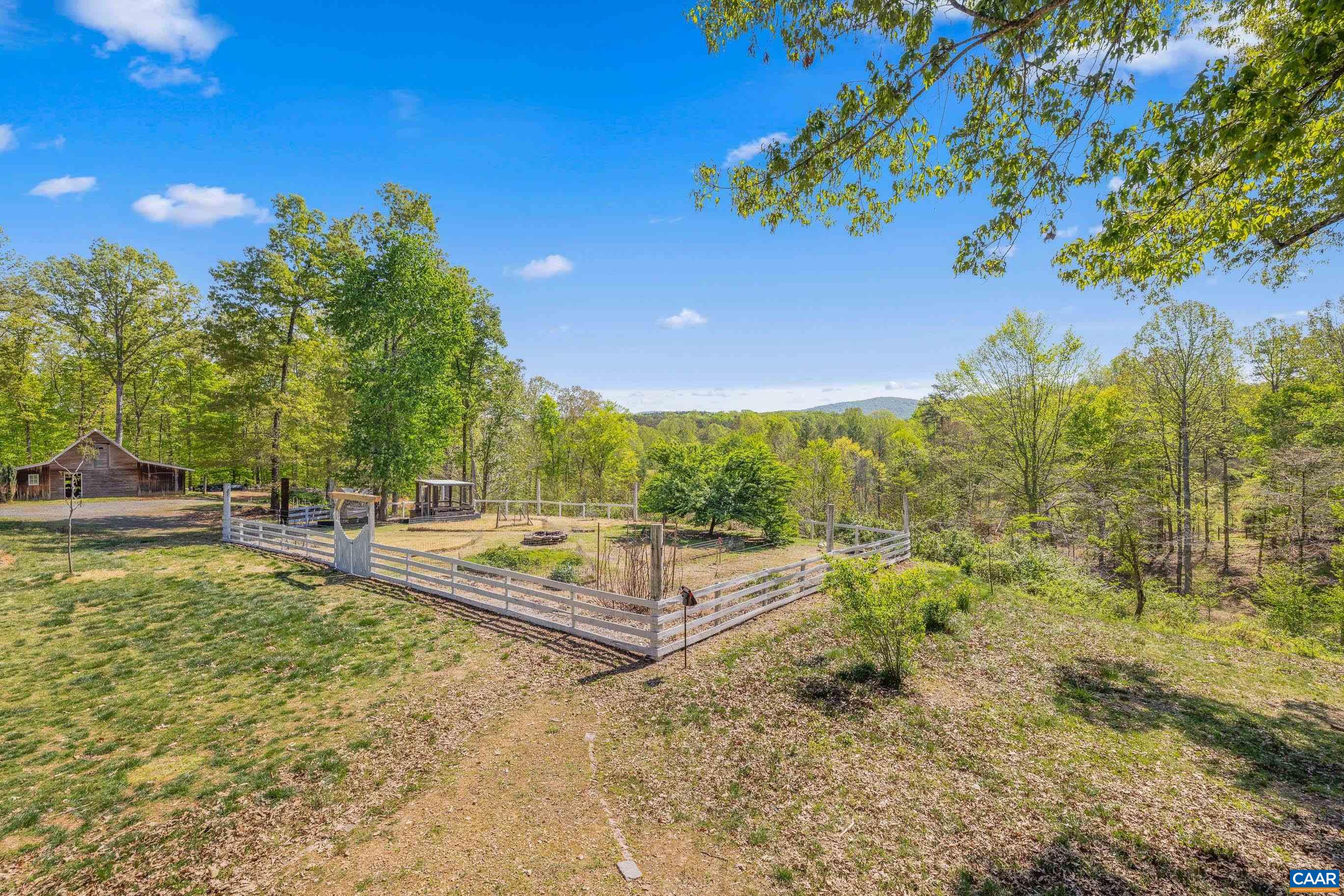 2947 Merrie Meadows Lane Keswick, VA 22947 - Photo 70 of 75 a view of a swimming pool with a patio