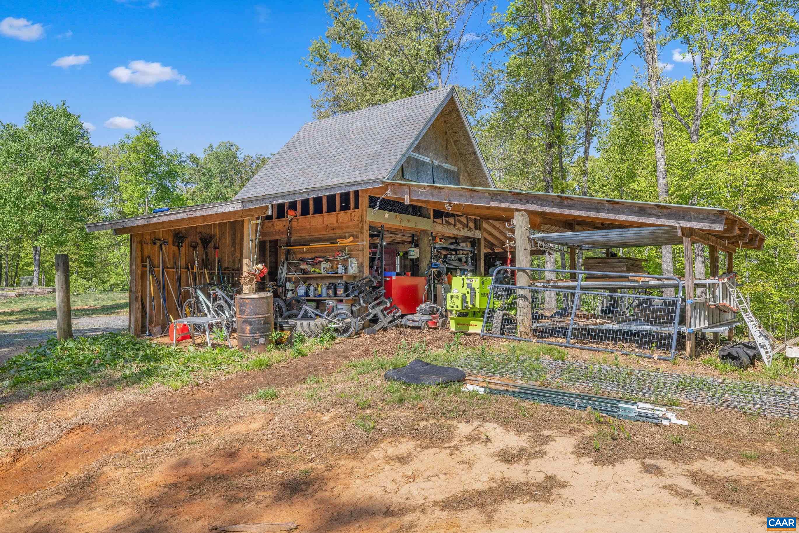 2947 Merrie Meadows Lane Keswick, VA 22947 - Photo 72 of 75 a view of a house with a porch
