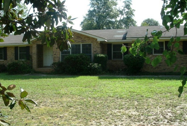a view of a house with garden