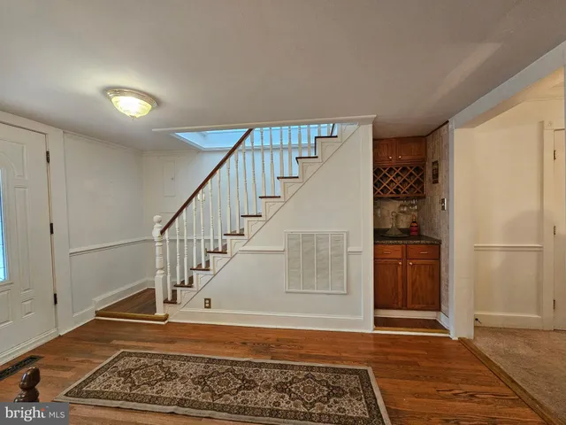 a view of entryway and workspace