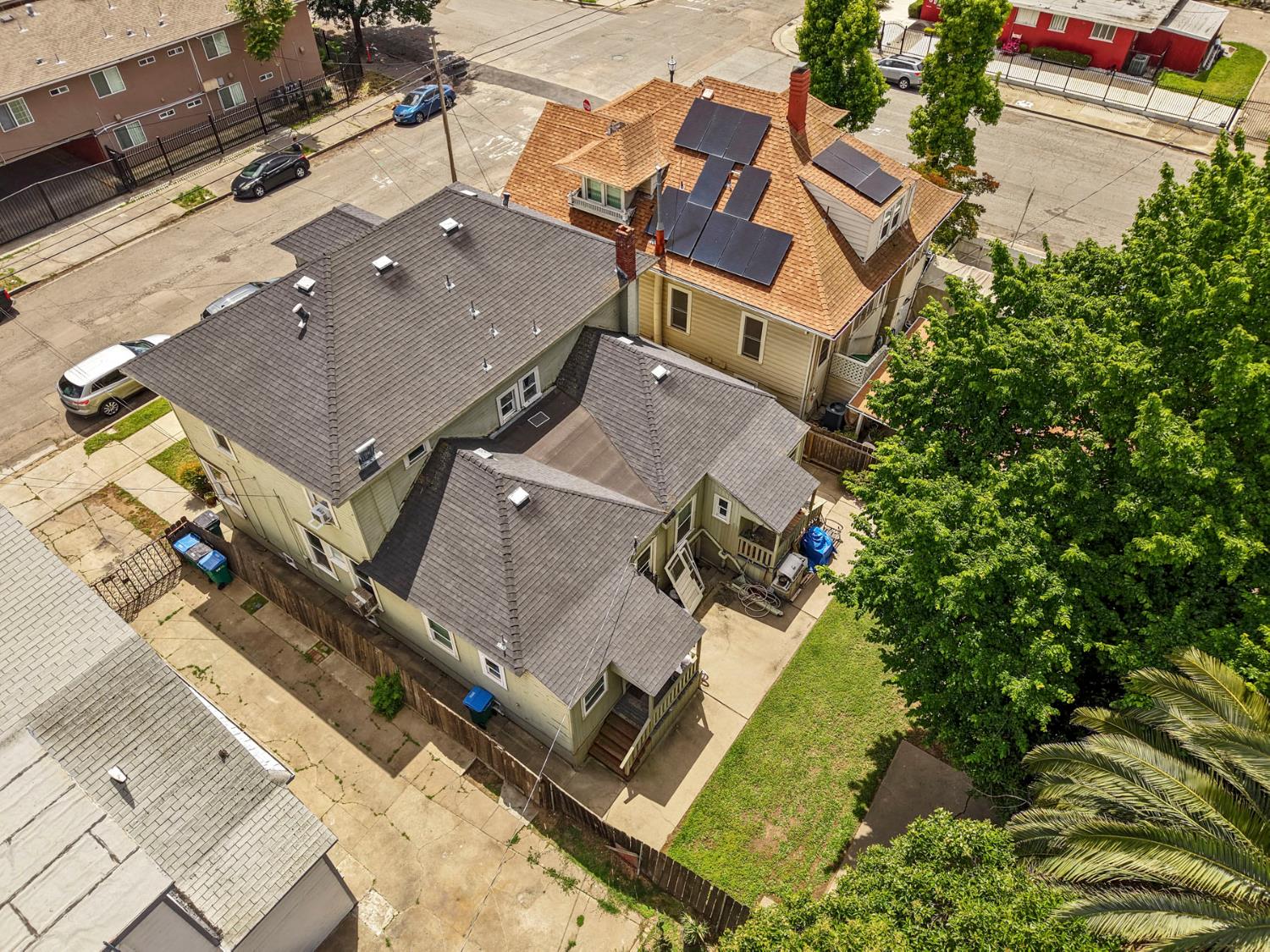 409 East Rose Street Stockton, CA 95202 - Photo 11 of 35 an aerial view of a house with a yard