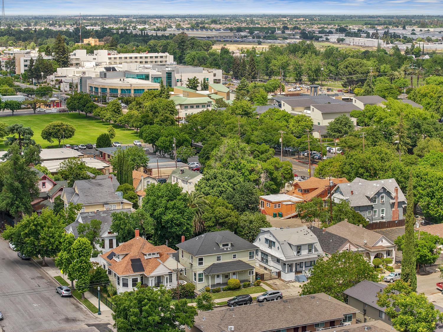 409 East Rose Street Stockton, CA 95202 - Photo 15 of 35 an aerial view of residential houses with outdoor space and trees