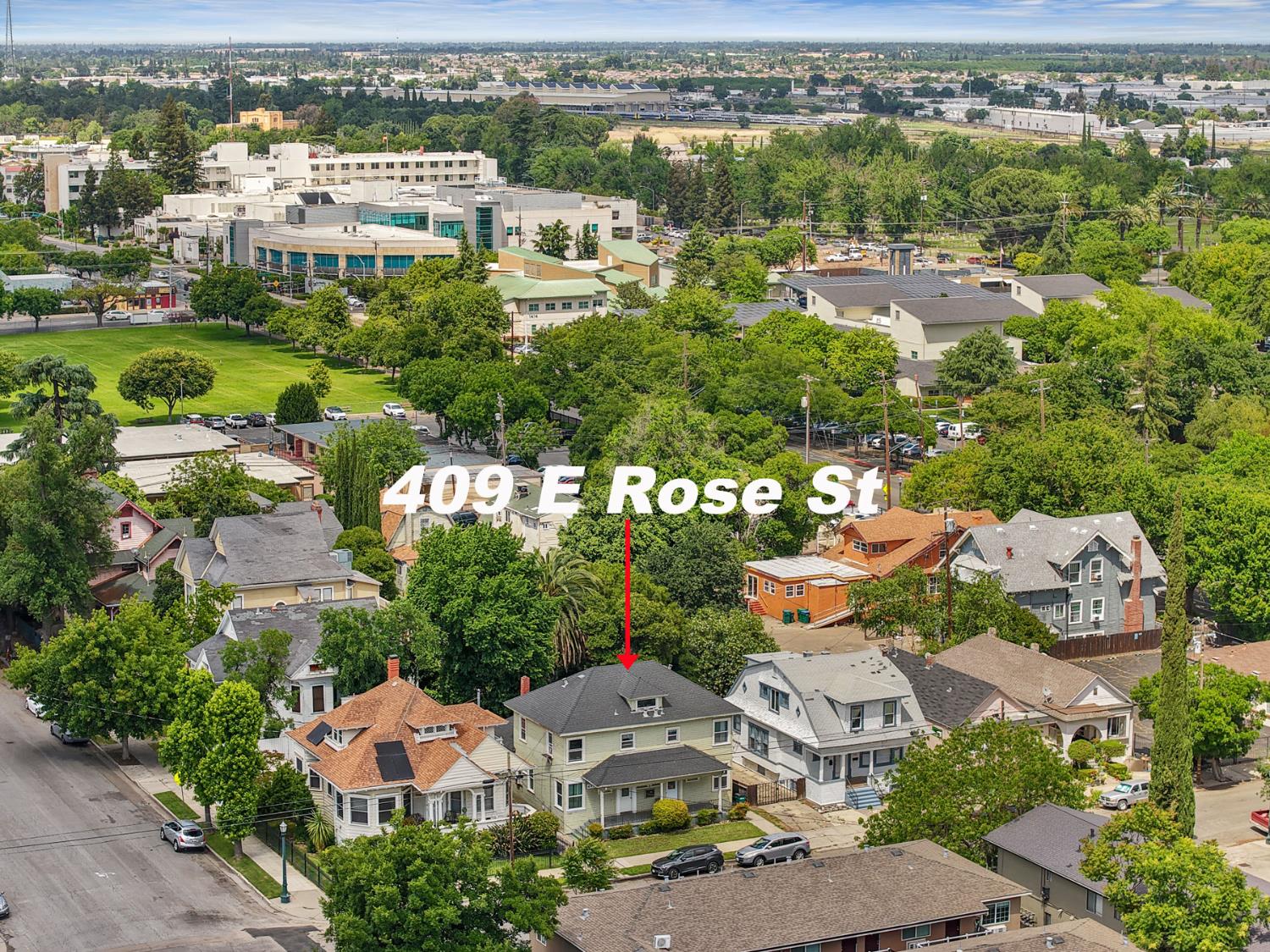 409 East Rose Street Stockton, CA 95202 - Photo 16 of 35 an aerial view of residential houses with outdoor space and trees