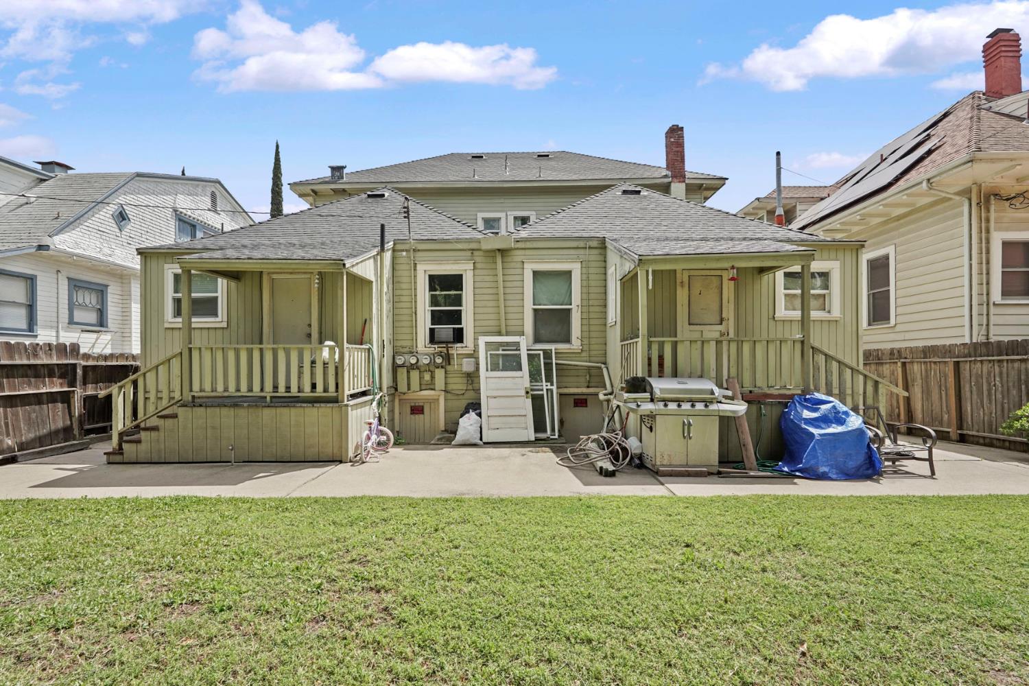 409 East Rose Street Stockton, CA 95202 - Photo 29 of 35 a front view of a house with garden