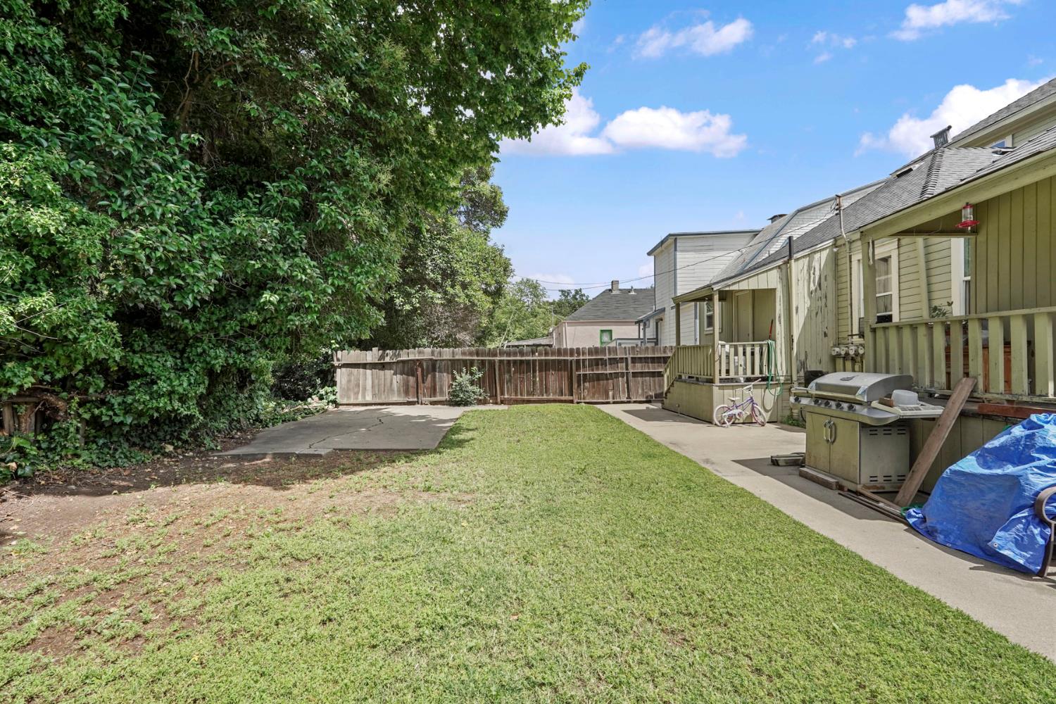 409 East Rose Street Stockton, CA 95202 - Photo 31 of 35 a view of backyard with swimming pool and seating space