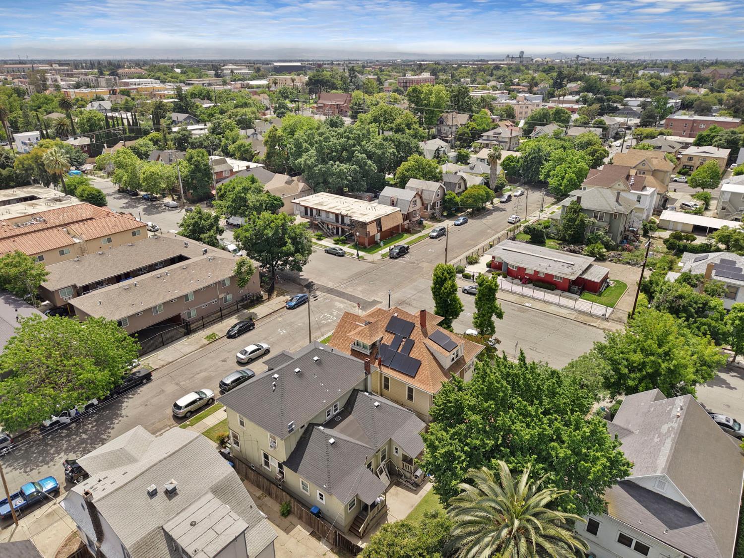 409 East Rose Street Stockton, CA 95202 - Photo 6 of 35 an aerial view of a city with lots of residential buildings