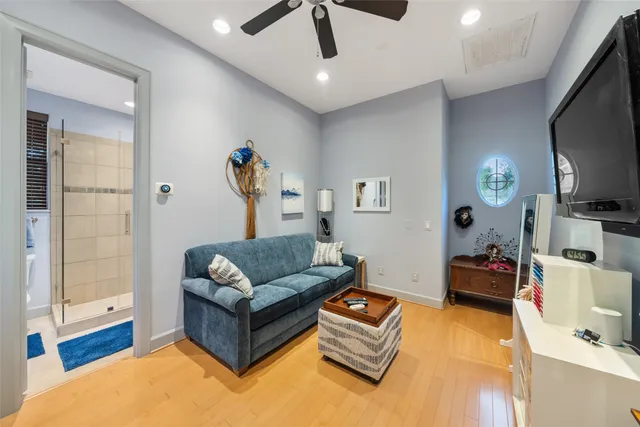 a living room with furniture and a window