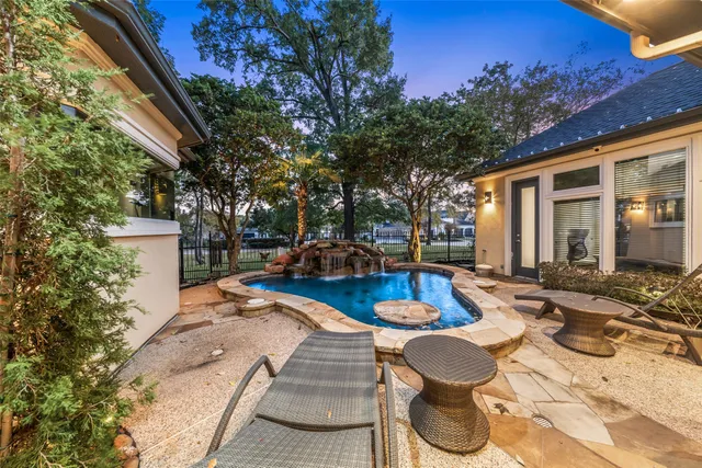 a view of a patio with chairs and tables