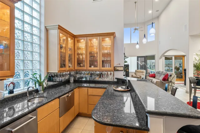 a outdoor space with patio furniture and a fireplace