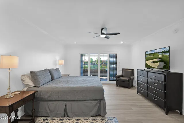 a bedroom with a bed and furniture