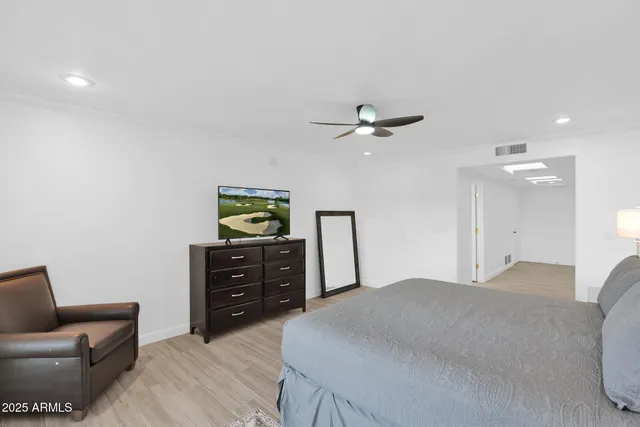 a bedroom with a bed and furniture