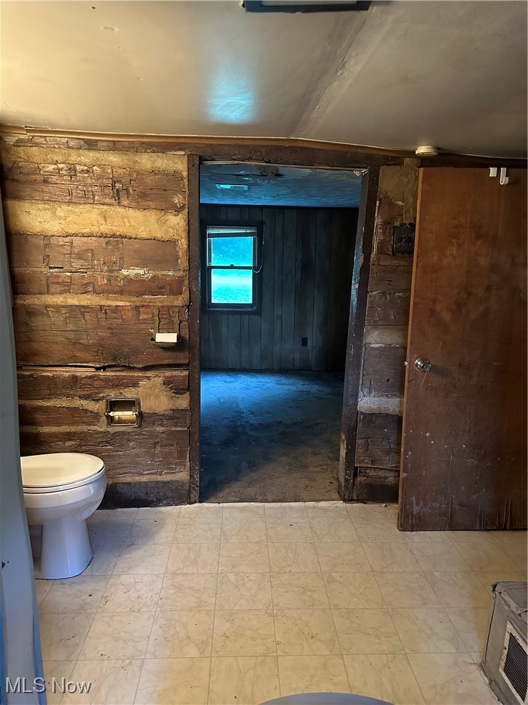 37114 Barber Ridge Road Woodsfield, OH 43793 - Photo 46 of 50 Bathroom featuring wood walls and toilet