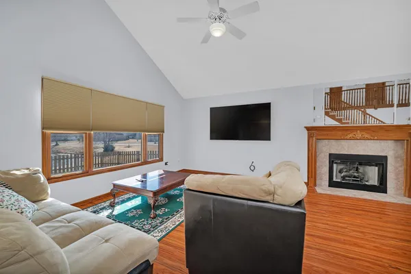 a kitchen with stainless steel appliances a stove a microwave and a cabinets