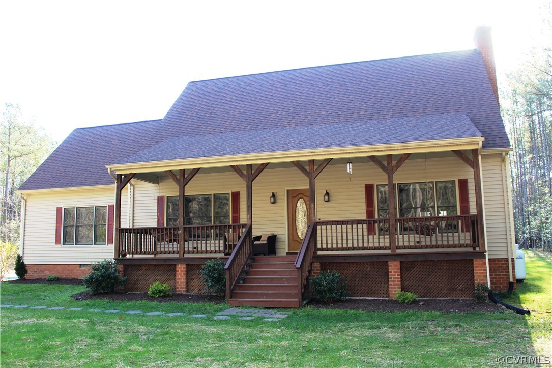 6501 Moseley Road Moseley, VA 23120 - Photo 1 of 27 a front view of a house with a yard