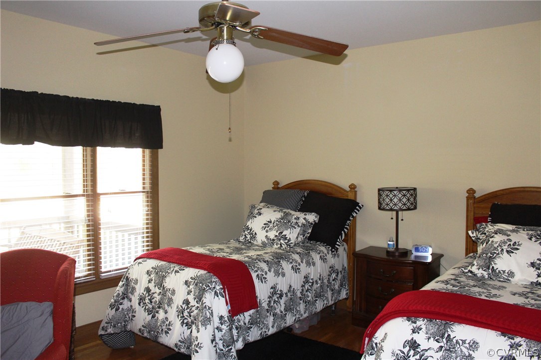 6501 Moseley Road Moseley, VA 23120 - Photo 17 of 27 a bedroom with bed and a window
