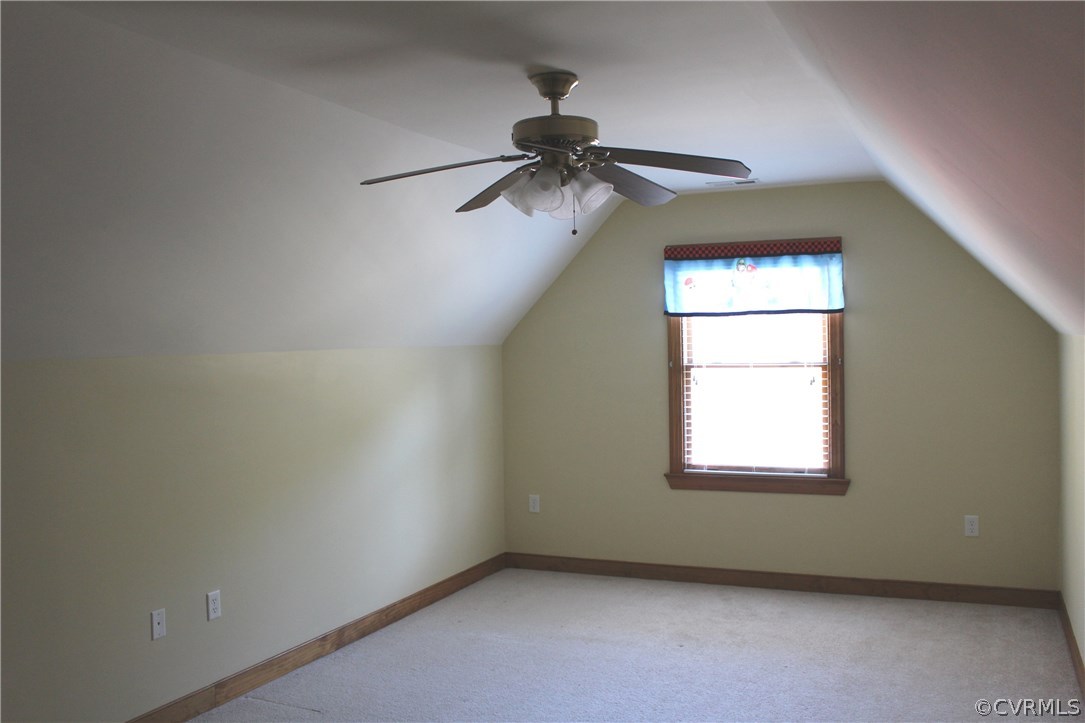 6501 Moseley Road Moseley, VA 23120 - Photo 20 of 27 an empty room with windows and fan
