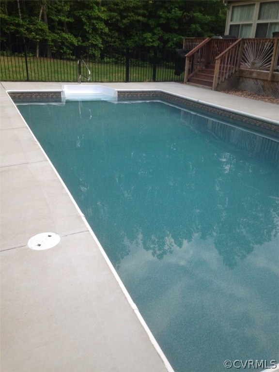 6501 Moseley Road Moseley, VA 23120 - Photo 25 of 27 a view of a swimming pool with a yard