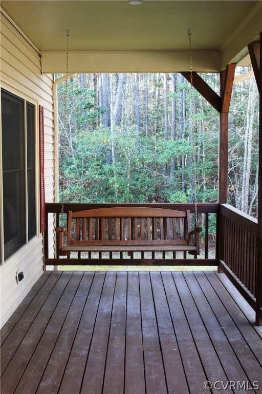 6501 Moseley Road Moseley, VA 23120 - Photo 4 of 27 a view of wooden balcony with furniture