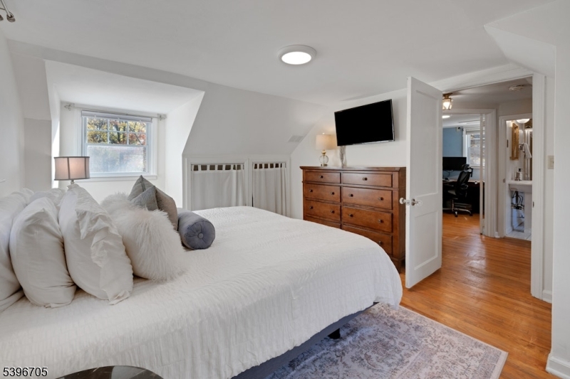 3 Maple Way Mountain Lakes, NJ 07046 - Photo 13 of 28 a bedroom with a bed and a flat screen tv
