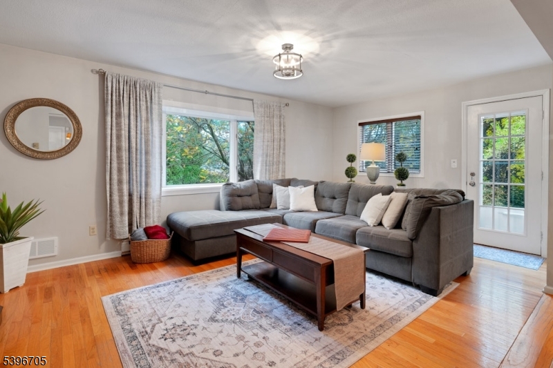 3 Maple Way Mountain Lakes, NJ 07046 - Photo 6 of 28 a living room with furniture and a wooden floor