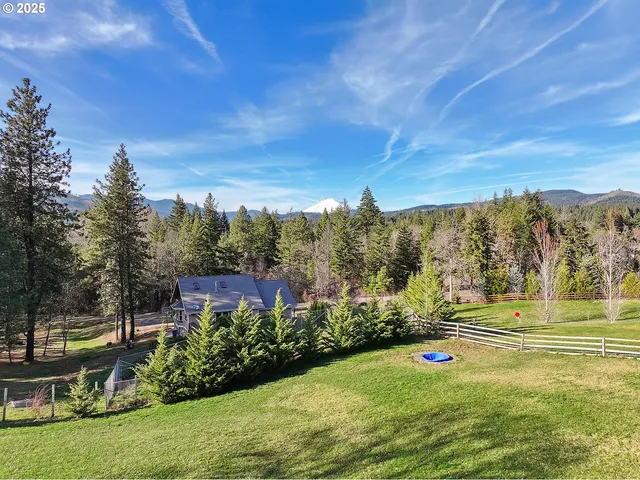 a view of a golf course with a lake