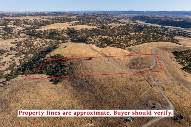 an aerial view of beach and ocean
