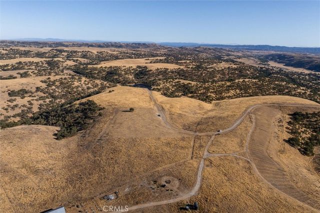 a view of ocean and mountain