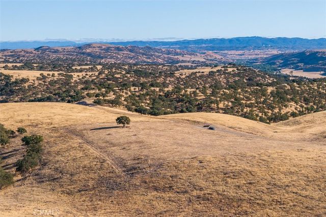 an aerial view of beach and city