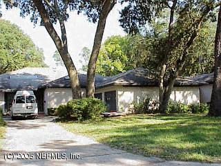 2735 Red Fox Road Orange Park, FL 32073 - Photo 1 of 1 a front view of a house with garden