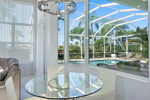 a utility room with sink dryer and washer