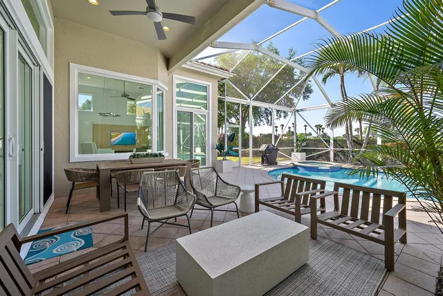 an aerial view of a house with a lake view