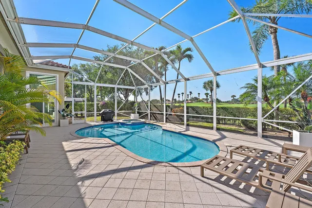 a view of a golf course with a lake
