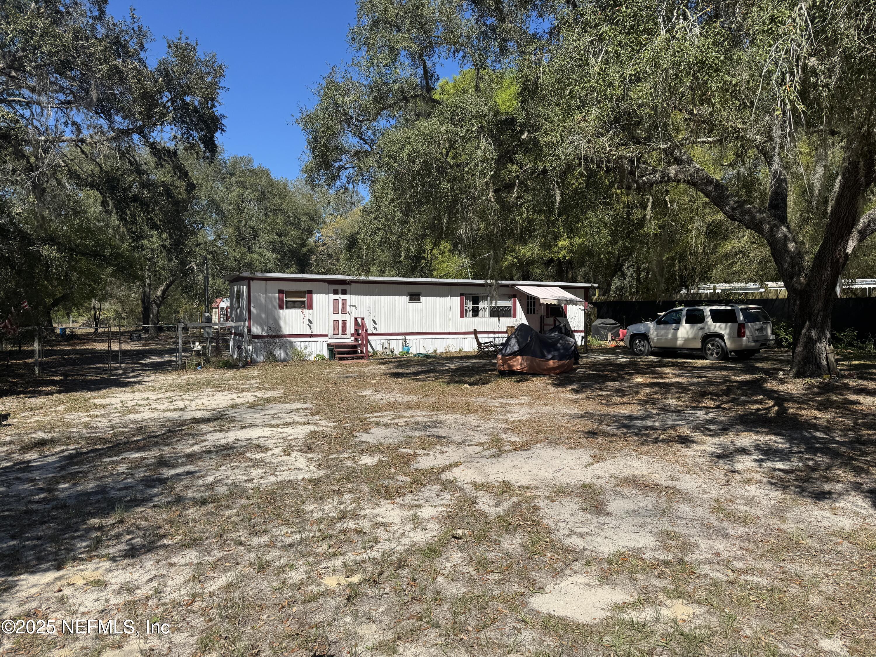208 Lakeview Road Melrose, FL 32666 - Photo 3 of 22 a view of house with outdoor space and sitting space