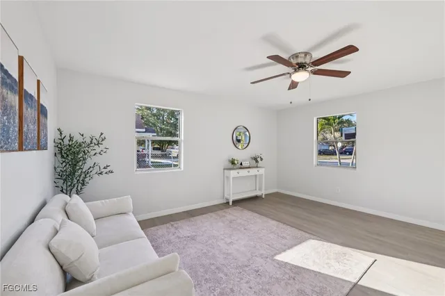 a living room with furniture and window