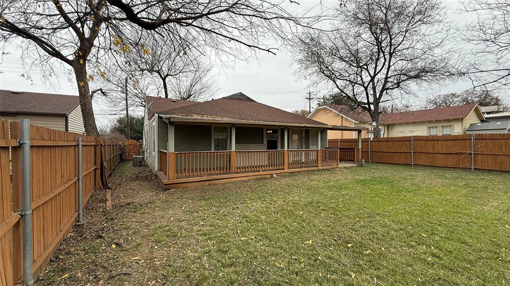 2246 Anson Road Dallas, TX 75235 - Photo 19 of 20 a front view of a house with a garden