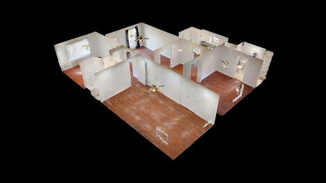 a view of living room with furniture and white floor