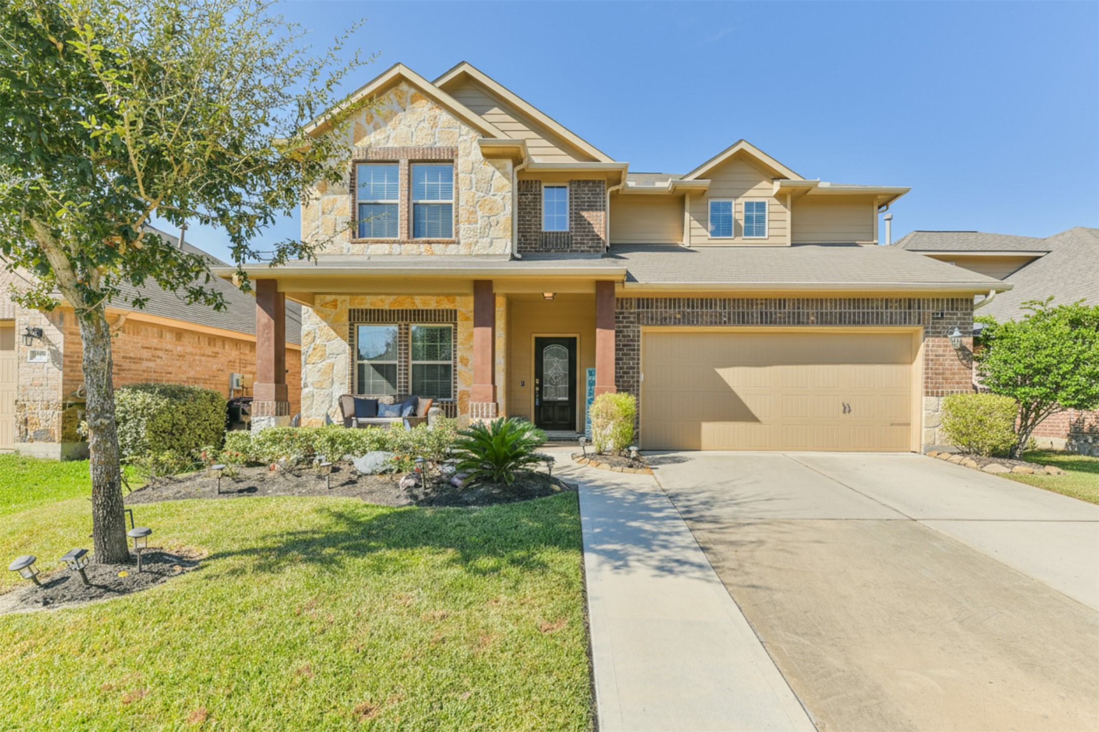 24047 Schults Meadow Lane Spring, TX 77389 - Photo 3 of 47 front view of house with a yard